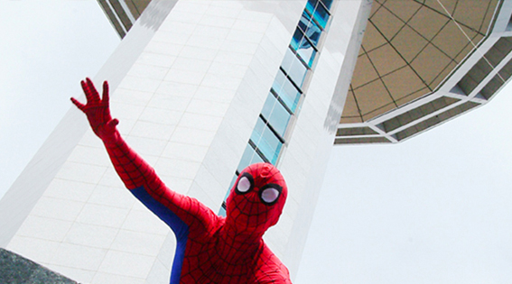 spiderman climbs control tower