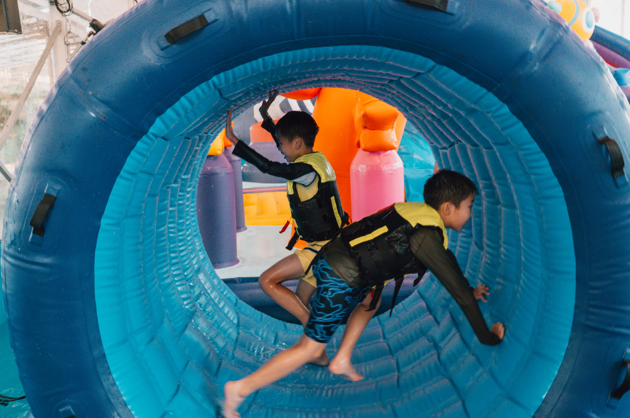 Children making their way through an obstacle course at Cosmic HydroPark at Changi Airport 